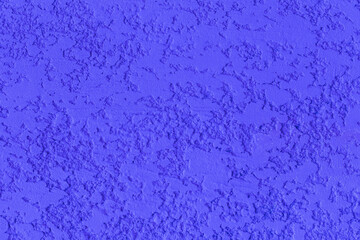 Blue paint on plaster wall stucco background rough solid structure texture abstract pattern