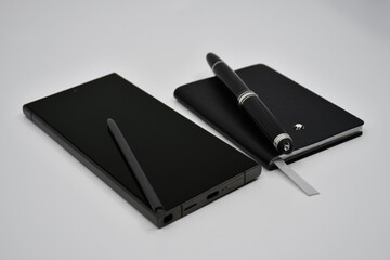 Luxury Smartphone and luxury notebook with pen