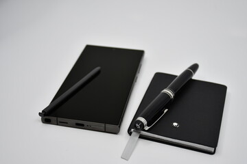 Luxury Smartphone and luxury notebook with pen