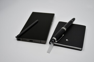 Luxury Smartphone and luxury notebook with pen