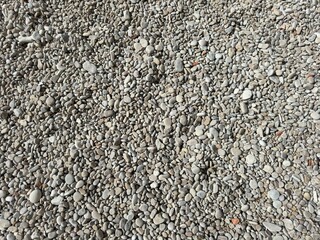 Beach background of smooth rounded stones.