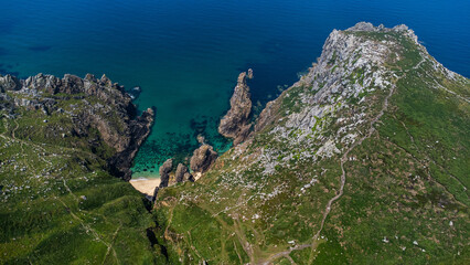 Hidden beach amongst the cliffs 