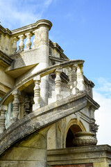 Obraz premium Spiral staircase made from stone on building exterior in traditional style