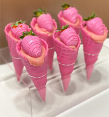 Delicious truffled chocolate cone with strawberry filling