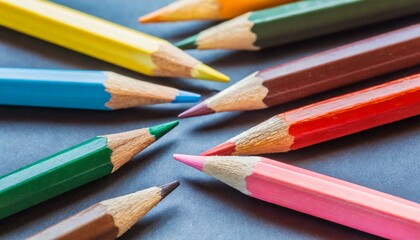 Fototapeta premium Colored pencils on a blue background