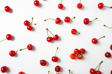 Ripe cherry on white summer fruits background