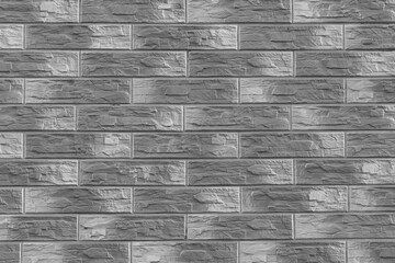 Grey and light brick wall with abstract pattern masonry texture background