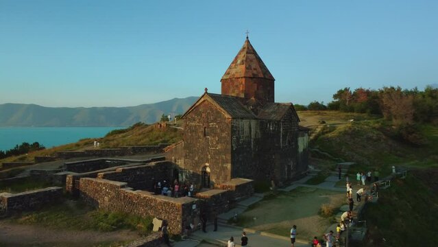 Drone shot of Sevanavank church with Lake Sevan in the background.