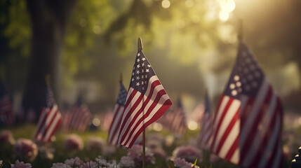 A solemn row of flags fluttering over the resting places of honored veterans on Memorial Day. - obrazy, fototapety, plakaty