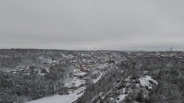 Aerial view of scandinavian town surrounded by nature in winter