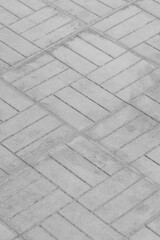 Gray stone paving slabs mosaic square floor street city road surface texture vertical background