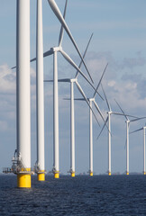Fototapeta premium Windturbines in the water producing alternative green energy