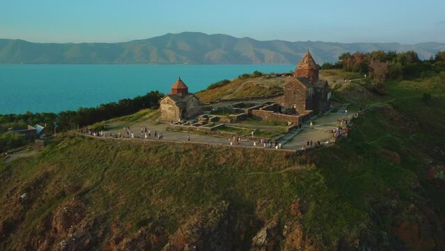Zoomed-in drone shot of Sevanavank church on Lake Sevan in Armenia.