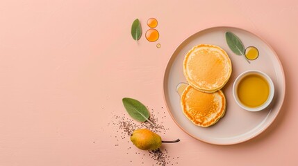  White plate, orange slices, orange juice, green leaf on pink background