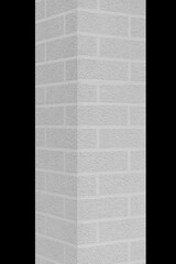 Brick grey column angle architecture abstract pattern detail element object exterior on black background isolated