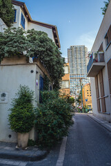 ael - October 20, 2015: Street in Neve Tzedek neighborhood in Tel Aviv city, Nehoshtan Tower on background, Israel