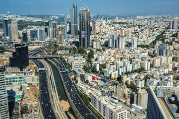 Naklejka na ściany i meble 2015: View from top floor of Azrieli Center Circular Tower in Tel Aviv with business district of Ramat Gan city and Ayalon Highway, Israel