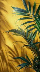 Fototapeta na wymiar Green Leaves Branch on Yellow Background