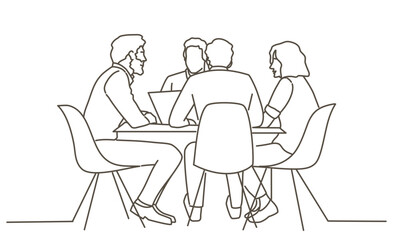 A group of people are sitting around a table, with one person using a laptop