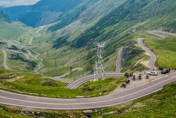 Aerial view from viewpoint of Balea Lake area on harpin turns of Transfagarasan Road, Romania - obrazy, fototapety, plakaty