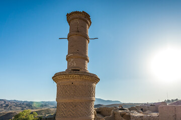 Shaking minaret in historic abandoned mud part of Kharanaq village, Iran