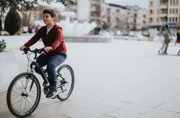 A cheerful young boy riding his bicycle through a park, showcasing a healthy, active lifestyle and the joy of childhood outdoors.