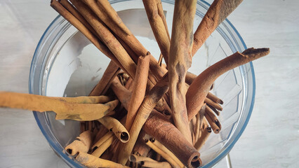 Pieces of dried cinnamon or Cinnamomum zeylanicum which is useful as a cooking spice and natural...