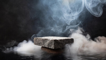 Gray natural raw granite stone surrounded by water and smoke. Abstract podium, product presentation