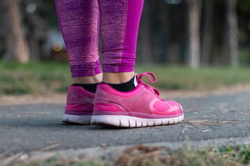 close up woman legs in sport shoes on the ground. sport and fitness