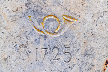 Engraved Post Horn and Year 1725 on Stone Surface in Löbau