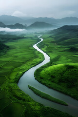 Fototapeta na wymiar Panoramic view of a Kilometers' Long Serene River Winding through Lush Green Valleys