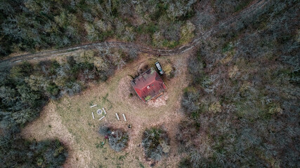 cabin in the woods, mountain lodge, hunting lodge, forest, hills, scary, hunting, aerial view