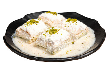 Baklava with white chocolate and milk. Cold baklava with chocolate isolated on white background. Famous dishes of Turkish cuisine