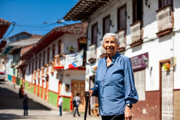Senior woman tourist at the beautiful heritage town of Salamina in the department of Caldas in...