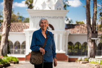 Senior woman tourist at the beautiful heritage town of Salamina in the department of Caldas in...