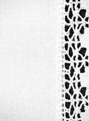 Photo of a white tablecloth with a crochet border - useful as a background with negative space