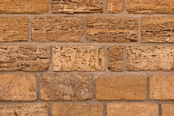Brown brick blocks shell sand stone wall texture background