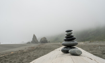 Stack of Gray Stones on Smooth Driftwood