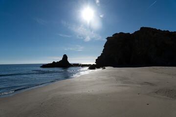 Beach of Media Luna with Volcanic Cliffs and Rocky Shoreline at Cabo de Gata, Spain