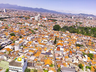 Cityscape of downtown district in Bandung city, Indonesia. View of the dense residential and...