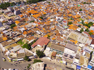 Aerial Landscape of an overpopulated residential district of Bandung city. View of the dense...