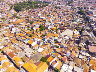Aerial Landscape of an overpopulated residential district of Bandung city. View of the dense...