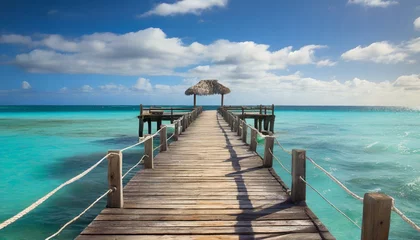 Fotobehang Old wooden pier over tropical waters © clsdesign