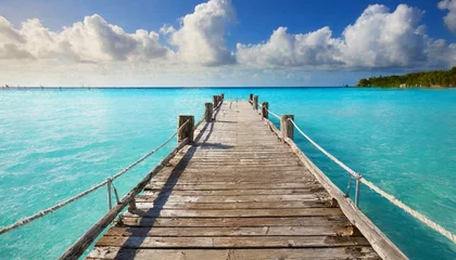 Fotobehang Old wooden pier over tropical waters © clsdesign