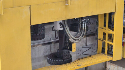 close up of Maintenace car guiding wheel, Yellow monorails maintaining car, stabilizing wheel