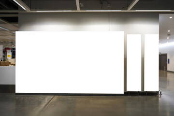 Mockup different sizes of blank billboards near the wall in building