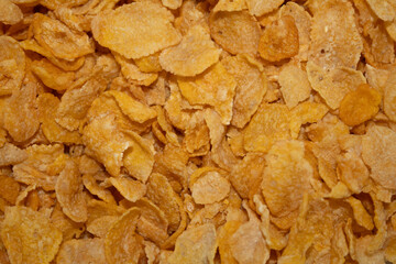 Close-up of corn flakes cereal on a white bowl