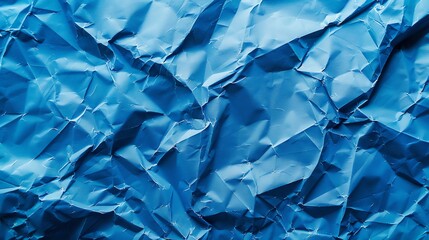 Background of blue crumpled paper sheets
