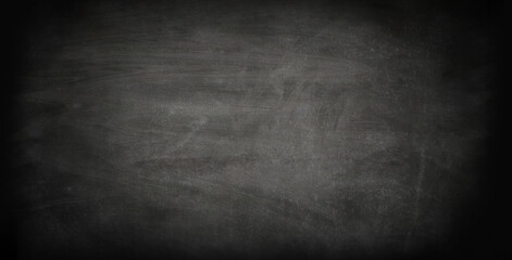 Chalkboard or black board texture abstract background with grunge dirt white chalk rubbed out on...
