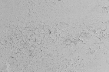 White light peeling cracked paint concrete wall cement texture background old plaster shabby stucco worn weathered